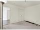 Clean bedroom with a closet, carpet, and lamp, offering a blank canvas for personalization at 10828 Young Lake Dr, Indianapolis, IN 46229