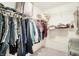 Spacious walk-in closet with ample hanging space and shelving for optimal organization at 10828 Young Lake Dr, Indianapolis, IN 46229