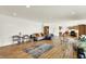 Expansive living room showcasing hardwood floors and natural light at 10828 Young Lake Dr, Indianapolis, IN 46229