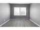This bedroom boasts neutral walls and a bright window, creating a serene and inviting space at 1130 W Congress Ave, Indianapolis, IN 46208