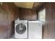 The laundry room features a modern washer and dryer, providing efficient functionality at 1130 W Congress Ave, Indianapolis, IN 46208