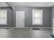 Spacious, bright living room featuring clean flooring, light-colored walls, and a welcoming ambiance at 1130 W Congress Ave, Indianapolis, IN 46208