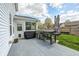 Backyard featuring a patio, grill, and lush green lawn, perfect for outdoor entertaining at 11419 Pegasus Dr, Noblesville, IN 46060