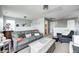 Open floor plan with comfortable seating and a view of the upper level at 11419 Pegasus Dr, Noblesville, IN 46060