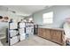 Well-lit room with organizers and a window, perfect for storage or hobbies at 11419 Pegasus Dr, Noblesville, IN 46060