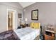Comfortable bedroom with soft lighting, personal touches, and cozy ambiance at 11620 E 75Th St, Indianapolis, IN 46236