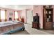 Bedroom with closet, safe, dresser and view to backyard at 11620 E 75Th St, Indianapolis, IN 46236