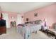 Bedroom with bed, linens, side tables, and good natural lighting at 11620 E 75Th St, Indianapolis, IN 46236