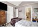 Comfortable bedroom with en suite bathroom access, soft lighting, and cozy ambiance at 11620 E 75Th St, Indianapolis, IN 46236