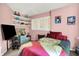 Bedroom with a bed, display shelves, and modern decor at 11620 E 75Th St, Indianapolis, IN 46236