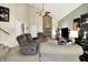 Bright living room with a brick fireplace and vaulted ceilings at 11620 E 75Th St, Indianapolis, IN 46236