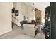Living room with a brick fireplace and vaulted ceilings at 11620 E 75Th St, Indianapolis, IN 46236