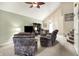 Spacious living room with a ceiling fan and stairs at 11620 E 75Th St, Indianapolis, IN 46236