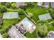 Aerial view of community pool, tennis courts, basketball court, walking trails, and lush landscaping at 12092 Sugar Creek Rd, Noblesville, IN 46060