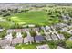 Stunning aerial view of a home on the golf course with lush greenery and neighborhood charm at 12092 Sugar Creek Rd, Noblesville, IN 46060