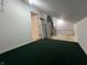 Unfinished attic space featuring carpet, a hot water tank, and an entrance to another room at 12092 Sugar Creek Rd, Noblesville, IN 46060