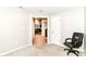 Neutral bedroom features a view of the dining room, and neutral carpet at 12092 Sugar Creek Rd, Noblesville, IN 46060