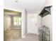 The entryway features a view into a living room, a white door, and coat storage at 12092 Sugar Creek Rd, Noblesville, IN 46060