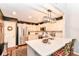 Bright kitchen with a quartz island, stainless appliances, and white cabinetry at 12092 Sugar Creek Rd, Noblesville, IN 46060