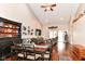 Open-concept living area features a dining room, living room, and access to the outdoor patio at 12092 Sugar Creek Rd, Noblesville, IN 46060