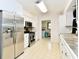 Bright kitchen featuring stainless steel appliances and ample cabinet space at 135 Hickory Ct, Greenwood, IN 46142