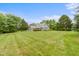 Lush backyard offers plenty of space for recreation and relaxation at 14655 Little Eagle Creek Ave, Zionsville, IN 46077