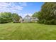 Expansive backyard is perfect for outdoor activities and enjoying the natural surroundings at 14655 Little Eagle Creek Ave, Zionsville, IN 46077