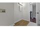 Functional laundry area with white walls, ceramic flooring, and hook ups for a washer and dryer at 14655 Little Eagle Creek Ave, Zionsville, IN 46077