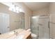 Bright bathroom featuring a vanity with double sinks and a walk-in shower at 16156 Oliver St, Fishers, IN 46037