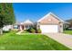 Attractive brick home with a well-kept lawn, attached garage, and inviting entrance at 16156 Oliver St, Fishers, IN 46037