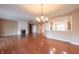 Spacious living room with hardwood floors, fireplace, and open layout for entertaining at 16156 Oliver St, Fishers, IN 46037