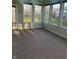 Inviting sunroom with ample natural light and views of the outdoors at 16156 Oliver St, Fishers, IN 46037