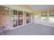 Bright sunroom featuring large sliding windows and neutral paint, a versatile space for relaxation and entertainment at 16156 Oliver St, Fishers, IN 46037