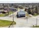 Aerial view of commercial building on a corner lot, with ample parking and street access at 1630 N Granville N Ave, Muncie, IN 47303