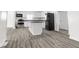 Modern kitchen with stainless steel appliances and white cabinetry at 1630 N Granville N Ave, Muncie, IN 47303