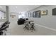 Finished basement with table seating, kitchenette, theater screen, and bar seating at 16305 Kenora N Ln, Fortville, IN 46040