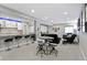 Finished basement with bar seating, kitchenette, theater screen, and comfortable seating at 16305 Kenora N Ln, Fortville, IN 46040