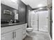 Finished basement bathroom with tiled floor and walk-in shower at 16305 Kenora N Ln, Fortville, IN 46040