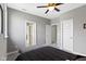 Spacious bedroom features a ceiling fan, plush carpet, and a neutral color palette at 16305 Kenora N Ln, Fortville, IN 46040