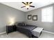 Bedroom with neutral walls, one window, carpet and furnished with a bed and nightstand at 16305 Kenora N Ln, Fortville, IN 46040