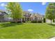 Attractive two-story house featuring manicured lawn and a welcoming front entrance at 16305 Kenora N Ln, Fortville, IN 46040
