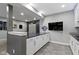 Basement kitchenette includes modern cabinets, a stone countertop, and tile backsplash at 16305 Kenora N Ln, Fortville, IN 46040