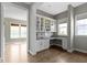 Bright office space with built-in cabinets, granite countertops and a window providing natural light at 16305 Kenora N Ln, Fortville, IN 46040