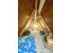 Finished attic space with A-frame ceiling, carpet, bed, and game table at 171 Williams Trce, Plainfield, IN 46168