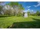 Spacious backyard featuring a quaint shed and lush green lawn at 171 Williams Trce, Plainfield, IN 46168