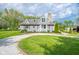 Charming home with updated exterior, stone chimney, and well-maintained yard with mature trees at 171 Williams Trce, Plainfield, IN 46168