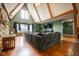Spacious living room with high ceilings, a stone fireplace, and large windows for ample natural light at 171 Williams Trce, Plainfield, IN 46168