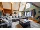 Spacious living room with natural light, a stone fireplace, and cozy window seat enhances the room's appeal at 171 Williams Trce, Plainfield, IN 46168