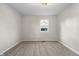 Bedroom with a window, neutral walls, and carpet at 1903 Danbury Dr, Indianapolis, IN 46231