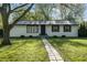 Charming home featuring a walkway, well-maintained lawn, and inviting curb appeal at 1903 Danbury Dr, Indianapolis, IN 46231